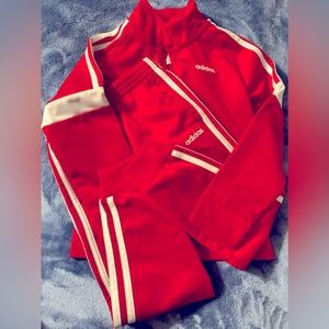 Red adidas track suit
